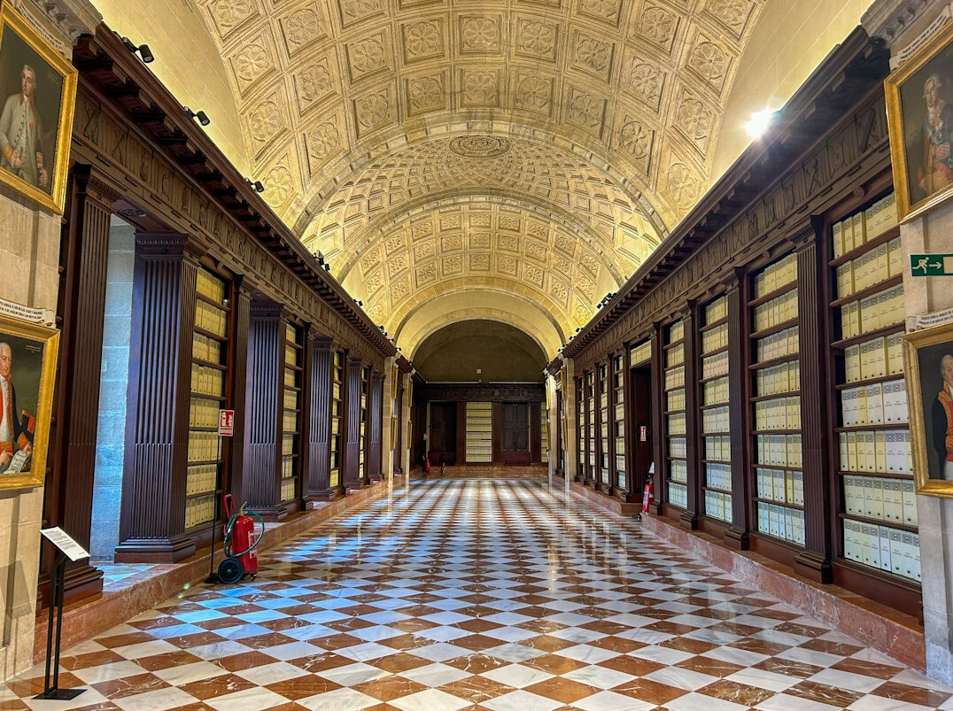Old archive room with tall shelves full of files and documents