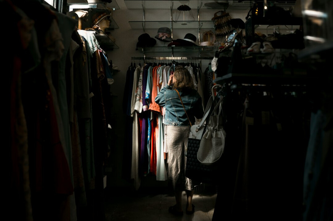 woman shopping in clothing store